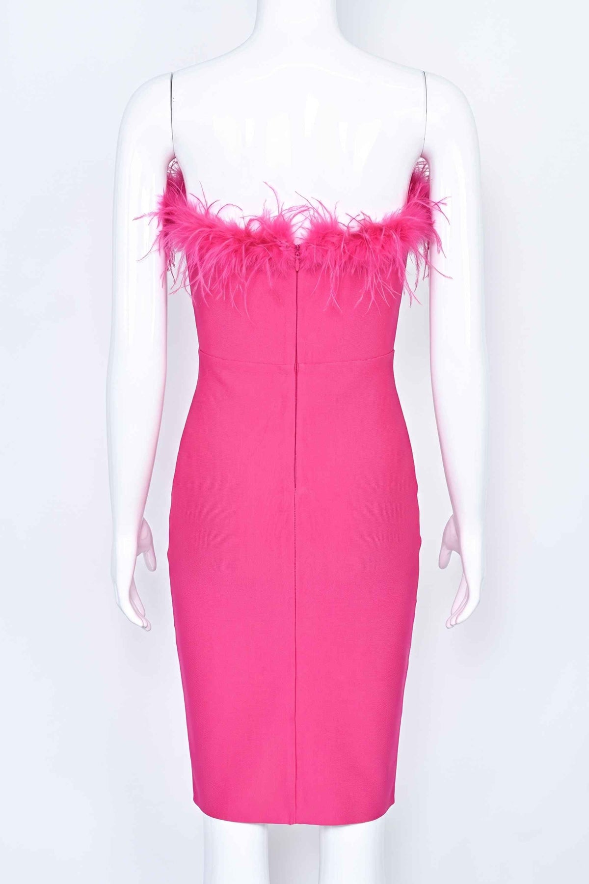 Woman wearing a figure flattering Erin Bandage Dress - Hot Pink BODYCON COLLECTION