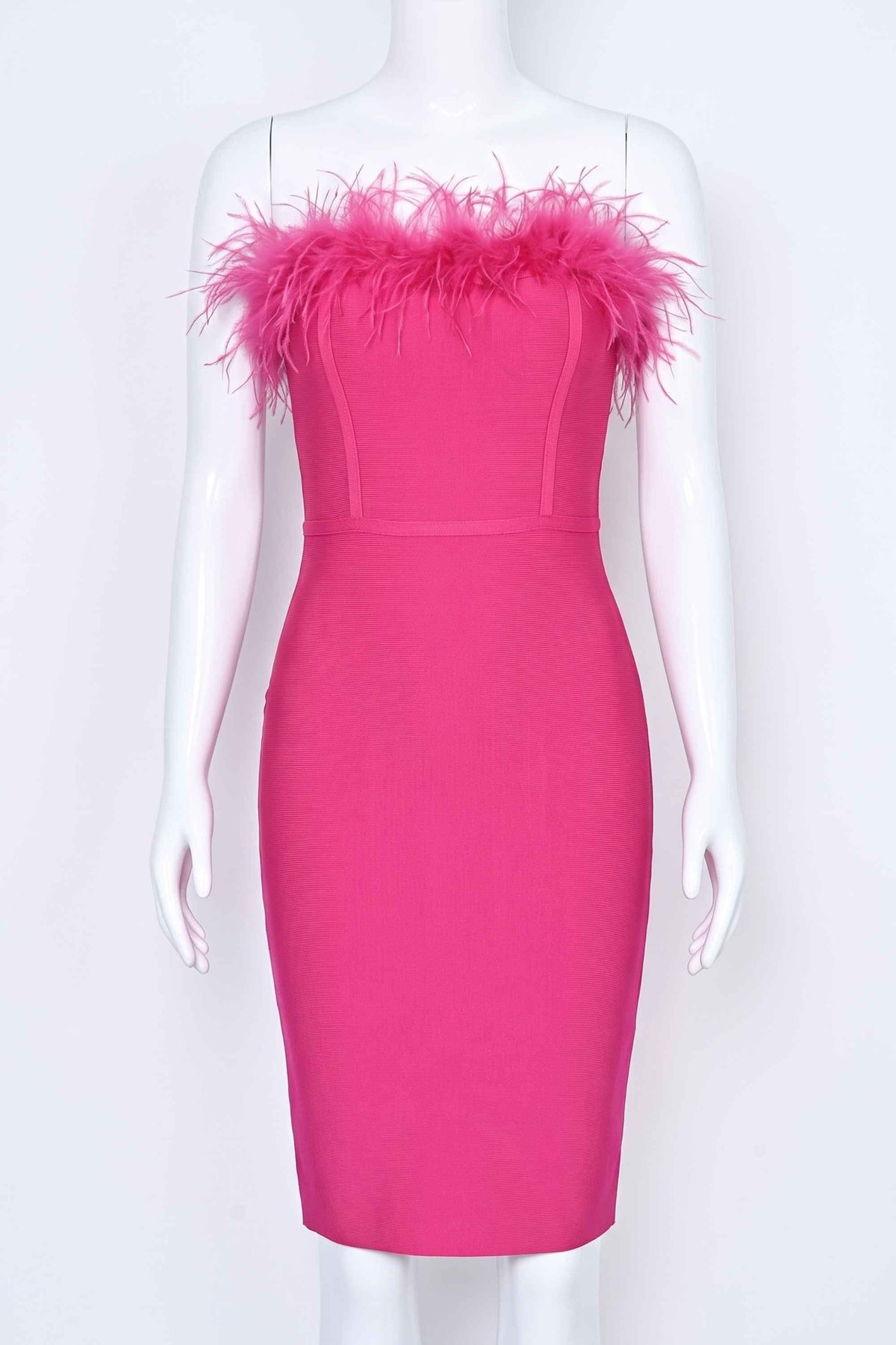 Woman wearing a figure flattering Erin Bandage Dress - Hot Pink BODYCON COLLECTION