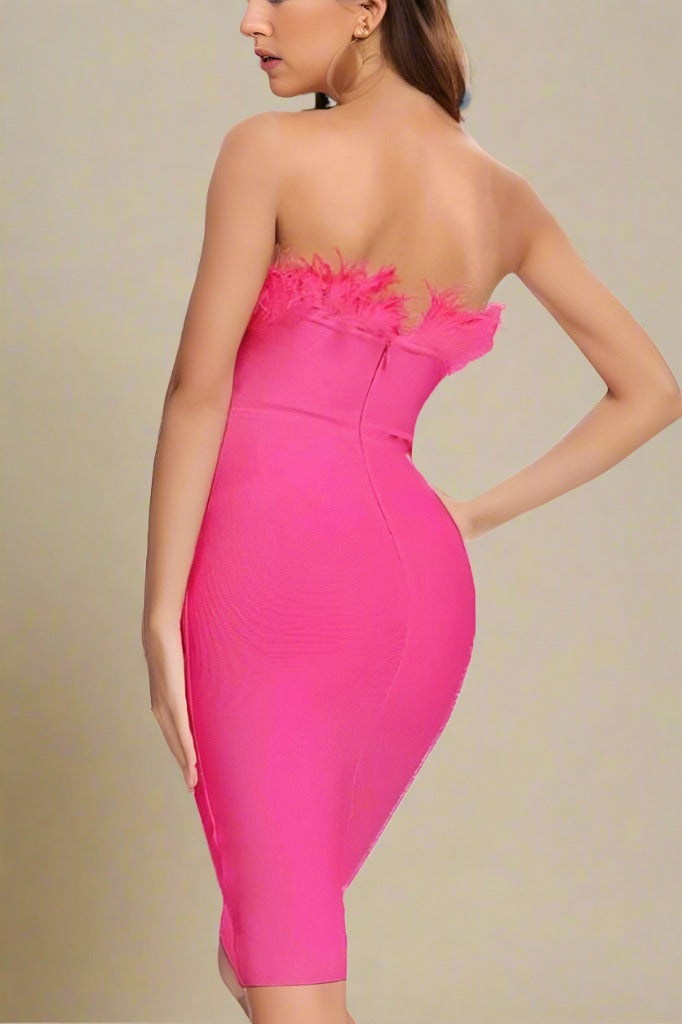 Woman wearing a figure flattering Erin Bandage Dress - Hot Pink BODYCON COLLECTION