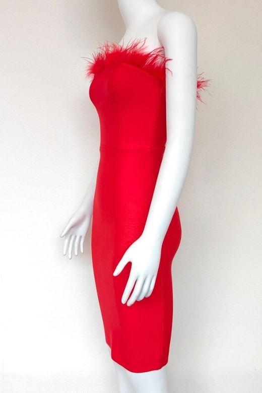 Woman wearing a figure flattering Erin Bandage Dress - Lipstick Red BODYCON COLLECTION
