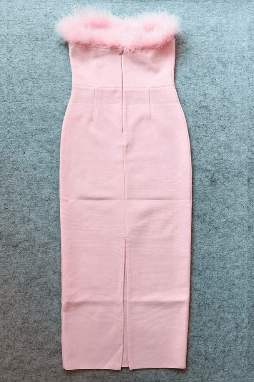 Woman wearing a figure flattering Erin Bodycon Maxi Dress - Dusty Pink BODYCON COLLECTION