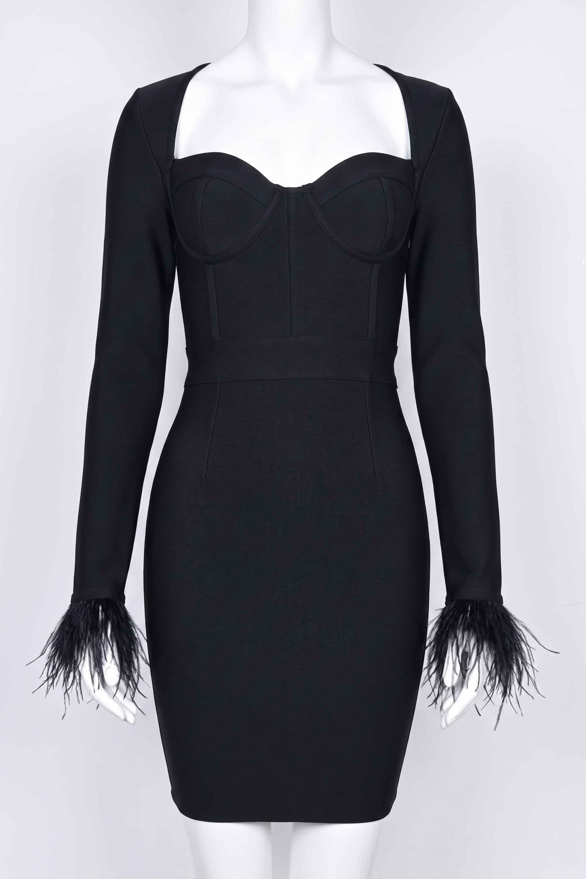 Woman wearing a figure flattering Erin Long Sleeve Bandage Mini Dress - Classic Black BODYCON COLLECTION