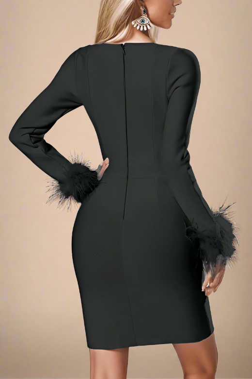 Woman wearing a figure flattering Erin Long Sleeve Mini Dress - Classic Black BODYCON COLLECTION