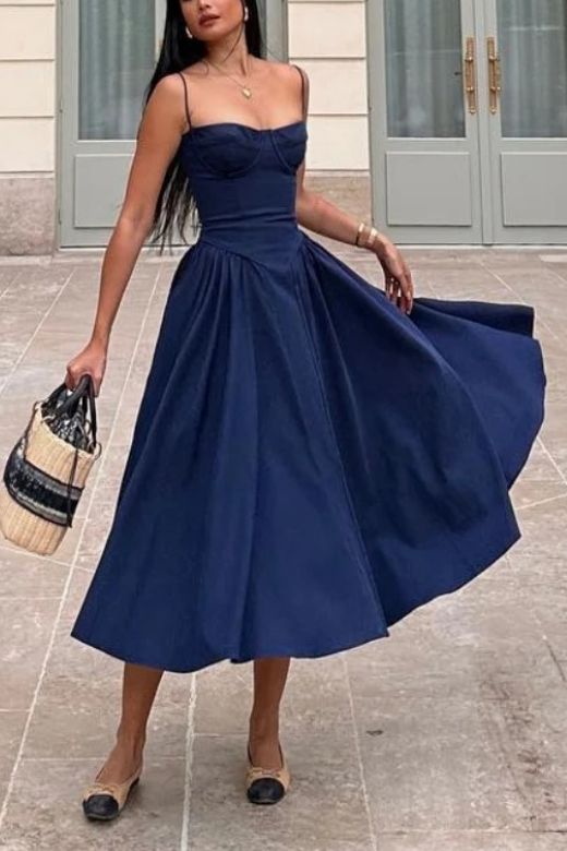 Woman wearing a figure flattering Everly Bodycon Day Midi Dress - Navy Blue BODYCON COLLECTION