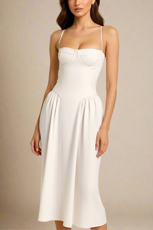 Woman wearing a figure flattering Everly Midi Dress - White Pearl BODYCON COLLECTION
