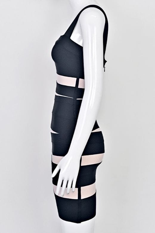 Woman wearing a figure flattering Fleur Bandage Mini Dress - Classic Black BODYCON COLLECTION Pty Ltd