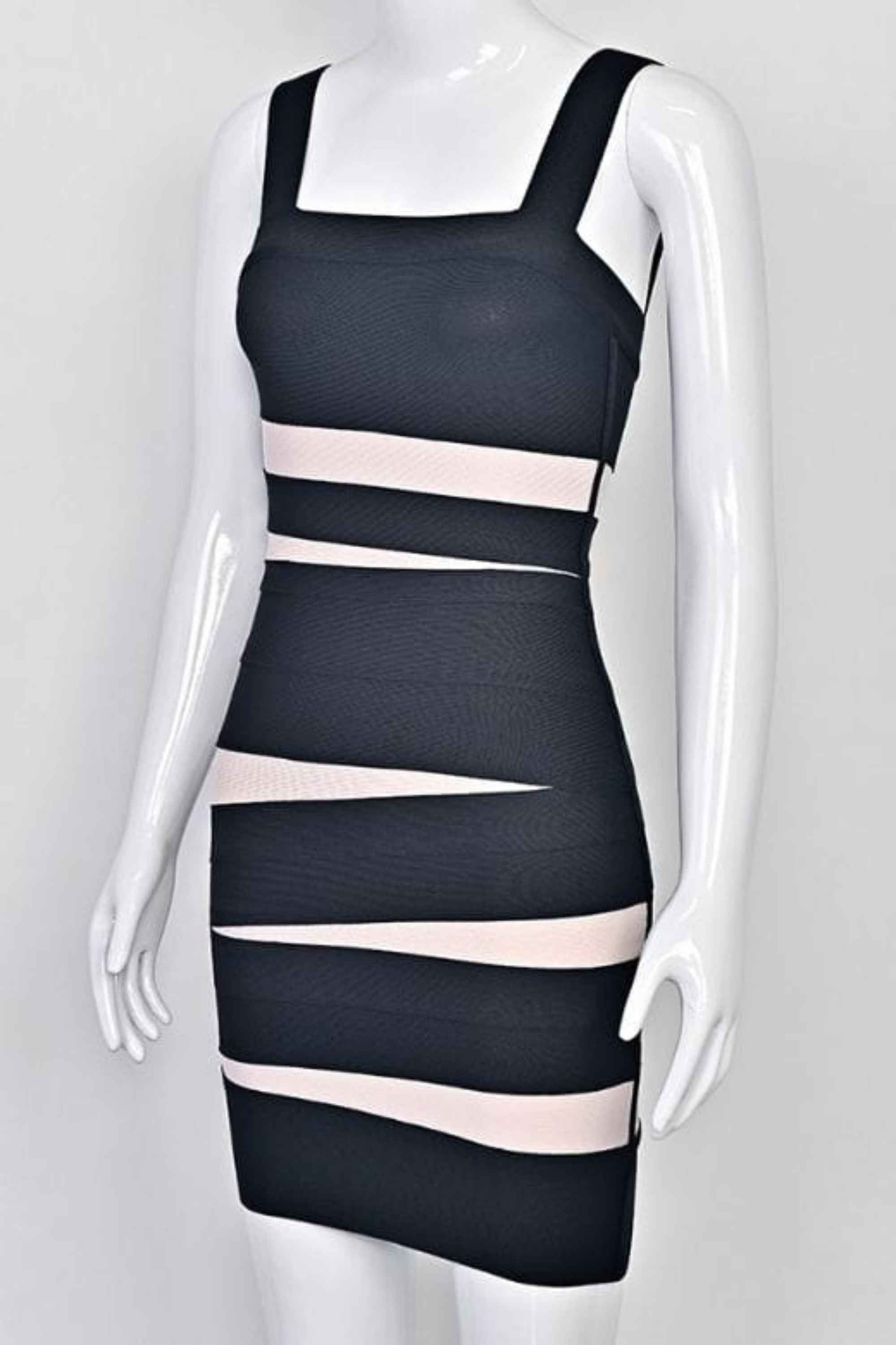 Woman wearing a figure flattering Fleur Bandage Mini Dress - Classic Black BODYCON COLLECTION Pty Ltd