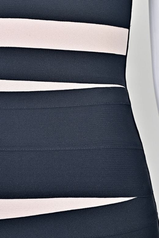 Woman wearing a figure flattering Fleur Bandage Mini Dress - Classic Black BODYCON COLLECTION Pty Ltd