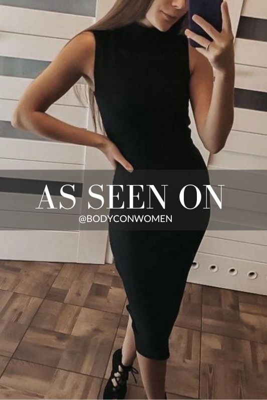 Woman wearing a figure flattering Grace Bandage Midi Dress - Classic Black Bodycon Collection