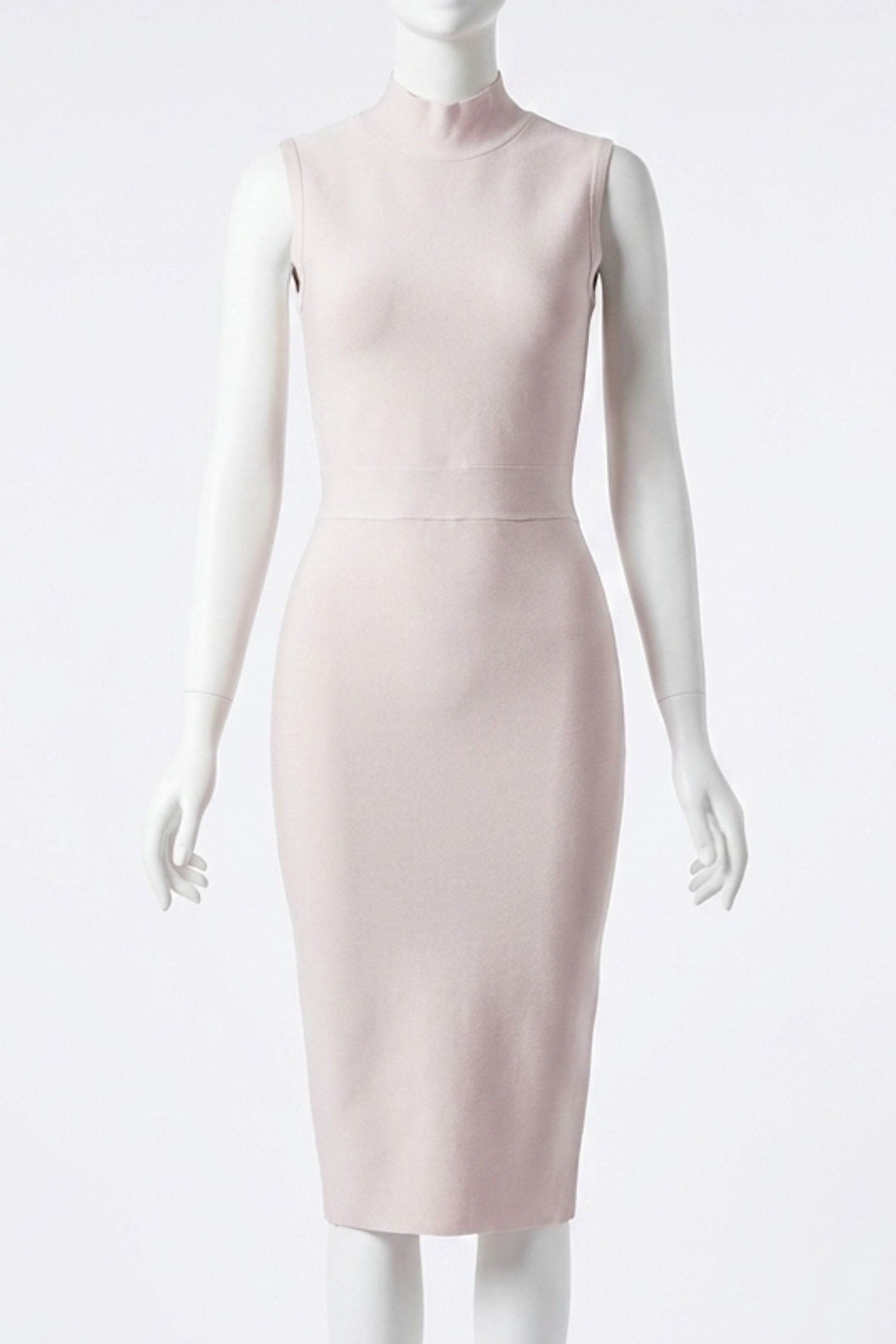 Woman wearing a figure flattering Grace Bandage Midi Dress - Cream Bodycon Collection