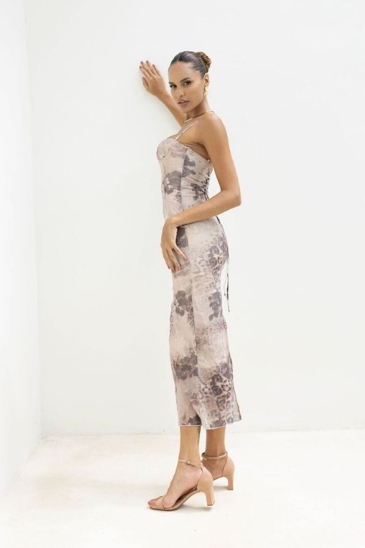 Woman wearing a figure flattering Harmony Bodycon Midi Dress - Nude BODYCON COLLECTION