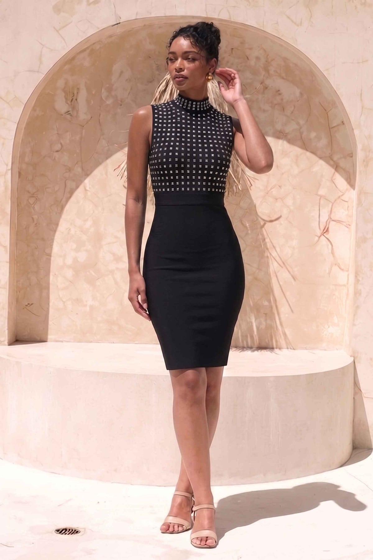 Woman wearing a figure flattering Hazel Bodycon Dress - Classic Black BODYCON COLLECTION Pty Ltd
