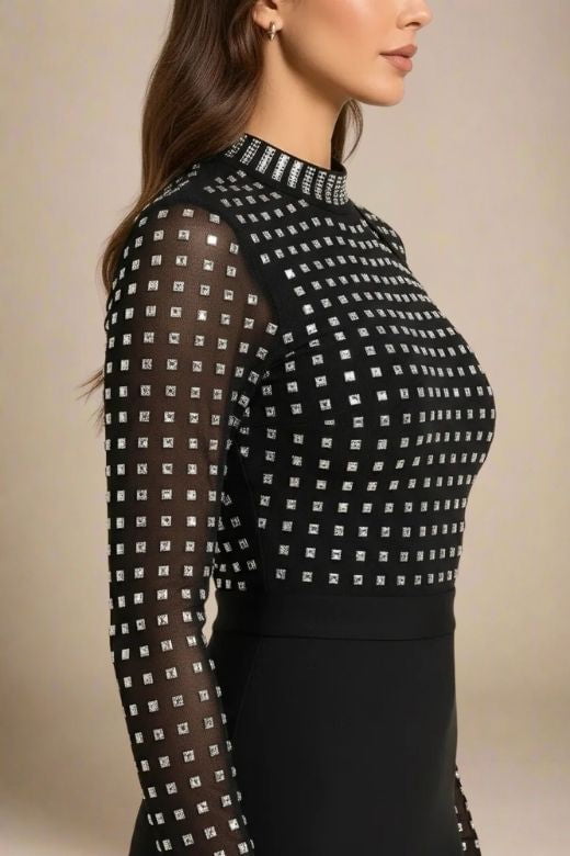 Woman wearing a figure flattering Hazel Long Sleeve Bodycon Dress - Classic Black BODYCON COLLECTION Pty Ltd