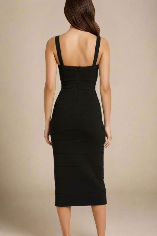 Woman wearing a figure flattering Heidi Bandage Midi Dress - Classic Black Bodycon Collection