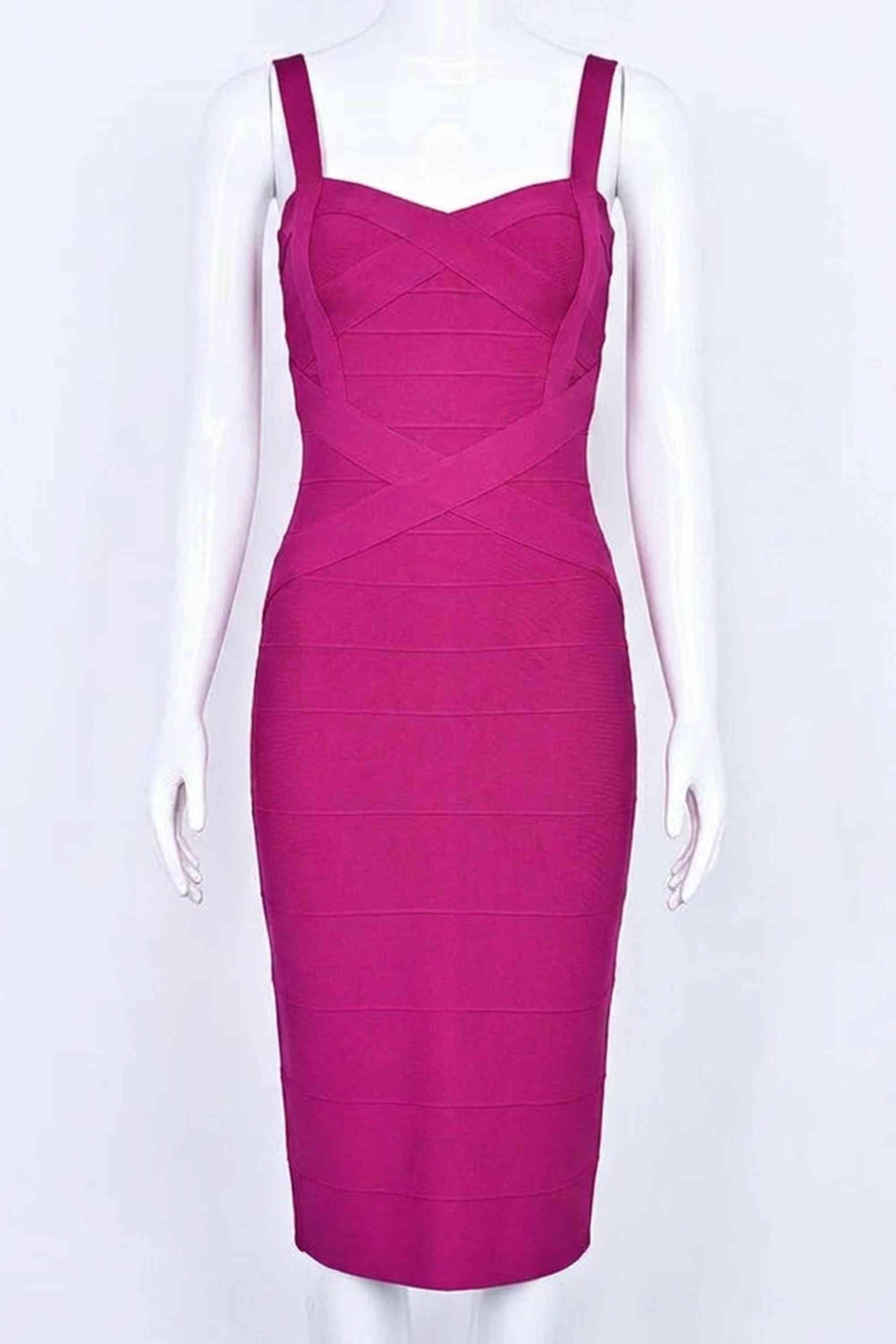 Woman wearing a figure flattering Heidi Bandage Midi Dress - Magenta Pink Bodycon Collection