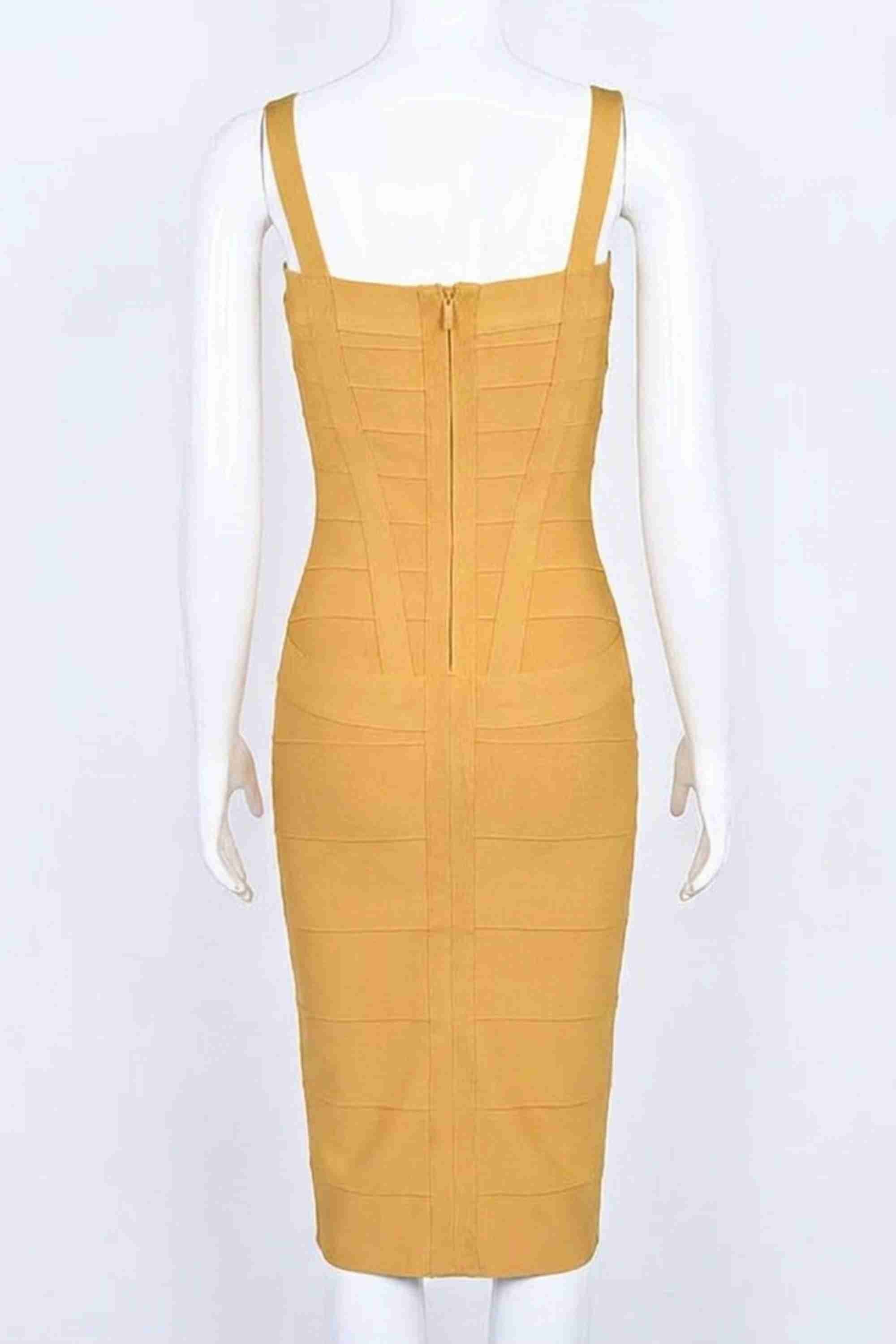 Woman wearing a figure flattering Heidi Bandage Midi Dress - Mustard Yellow Bodycon Collection
