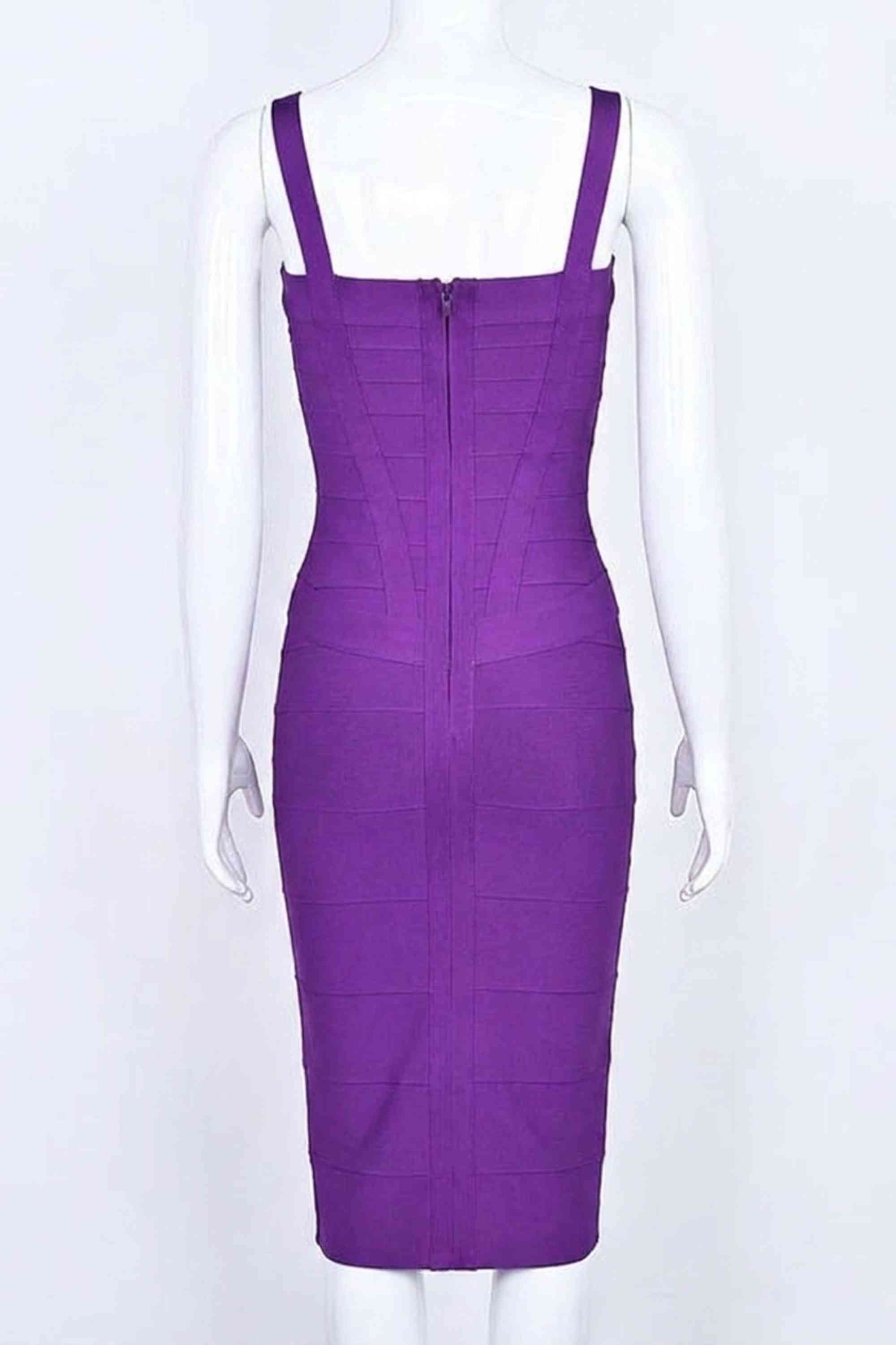 Woman wearing a figure flattering Heidi Bandage Midi Dress - Plum Purple Bodycon Collection