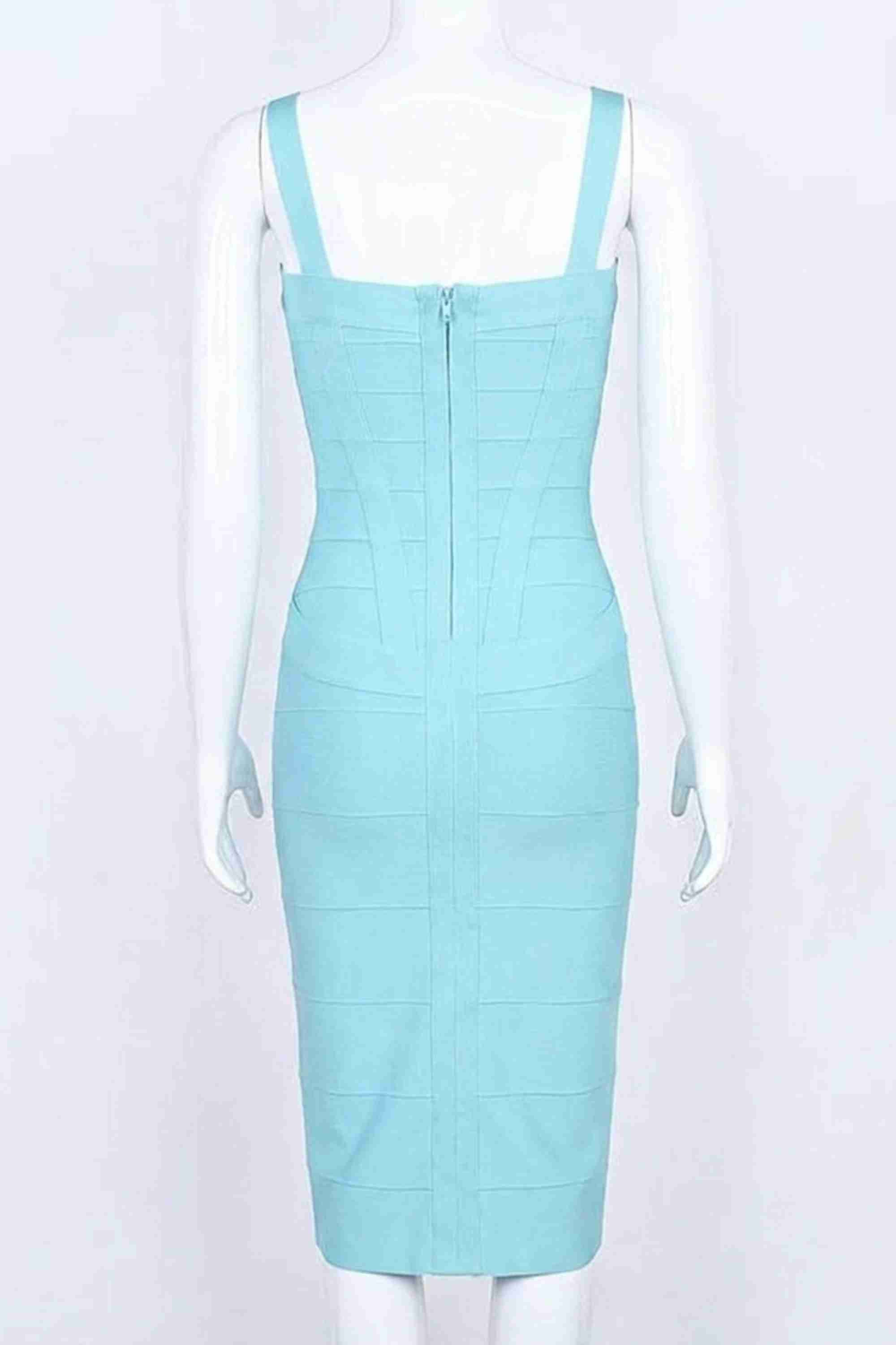 Woman wearing a figure flattering Heidi Bandage Midi Dress - Sky Blue Bodycon Collection