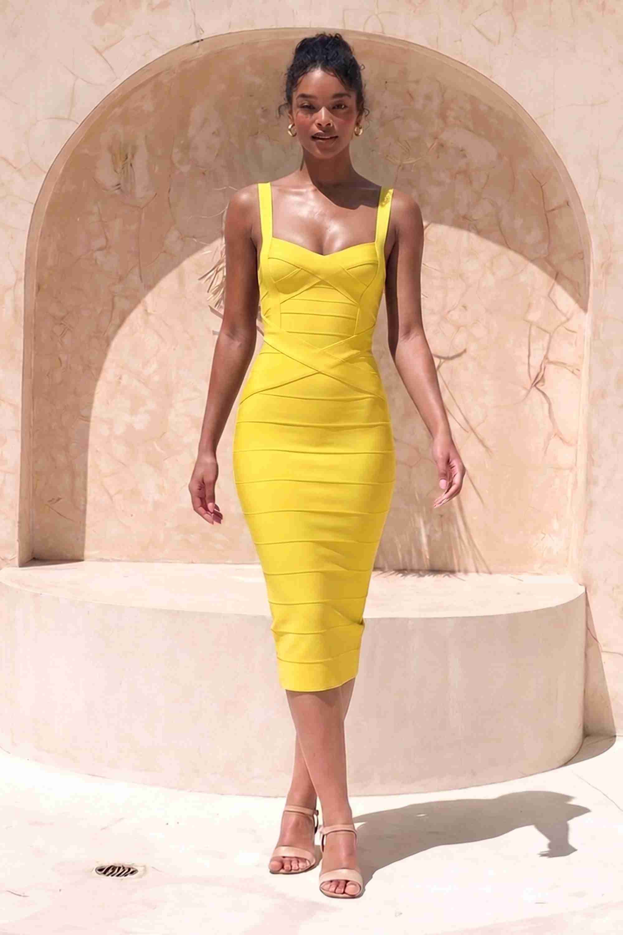 Woman wearing a figure flattering yellow party dress Heidi Bandage Midi Dress - Sun Yellow Bodycon Collection