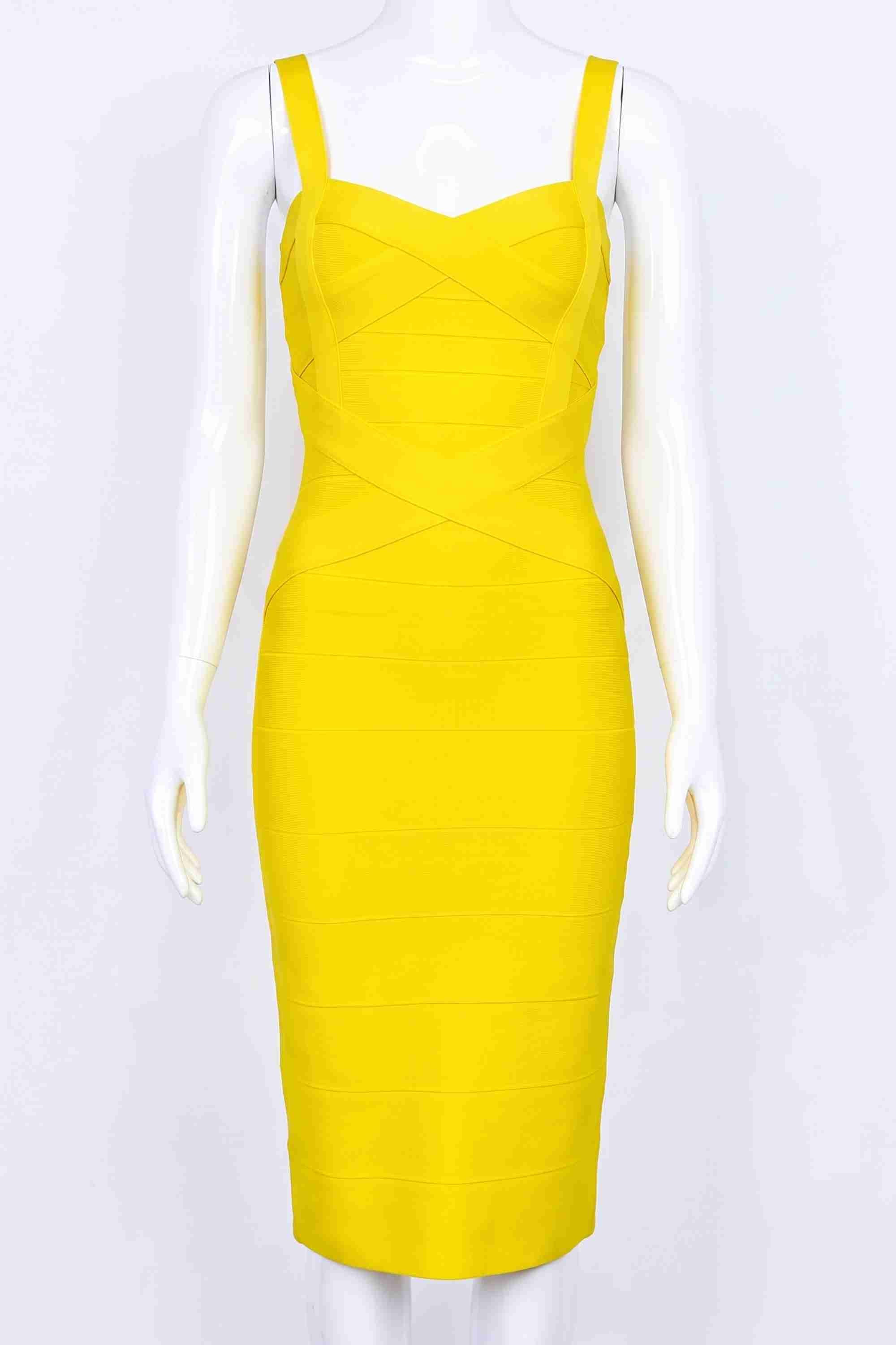 Woman wearing a figure flattering Heidi Bandage Midi Dress - Sun Yellow Bodycon Collection