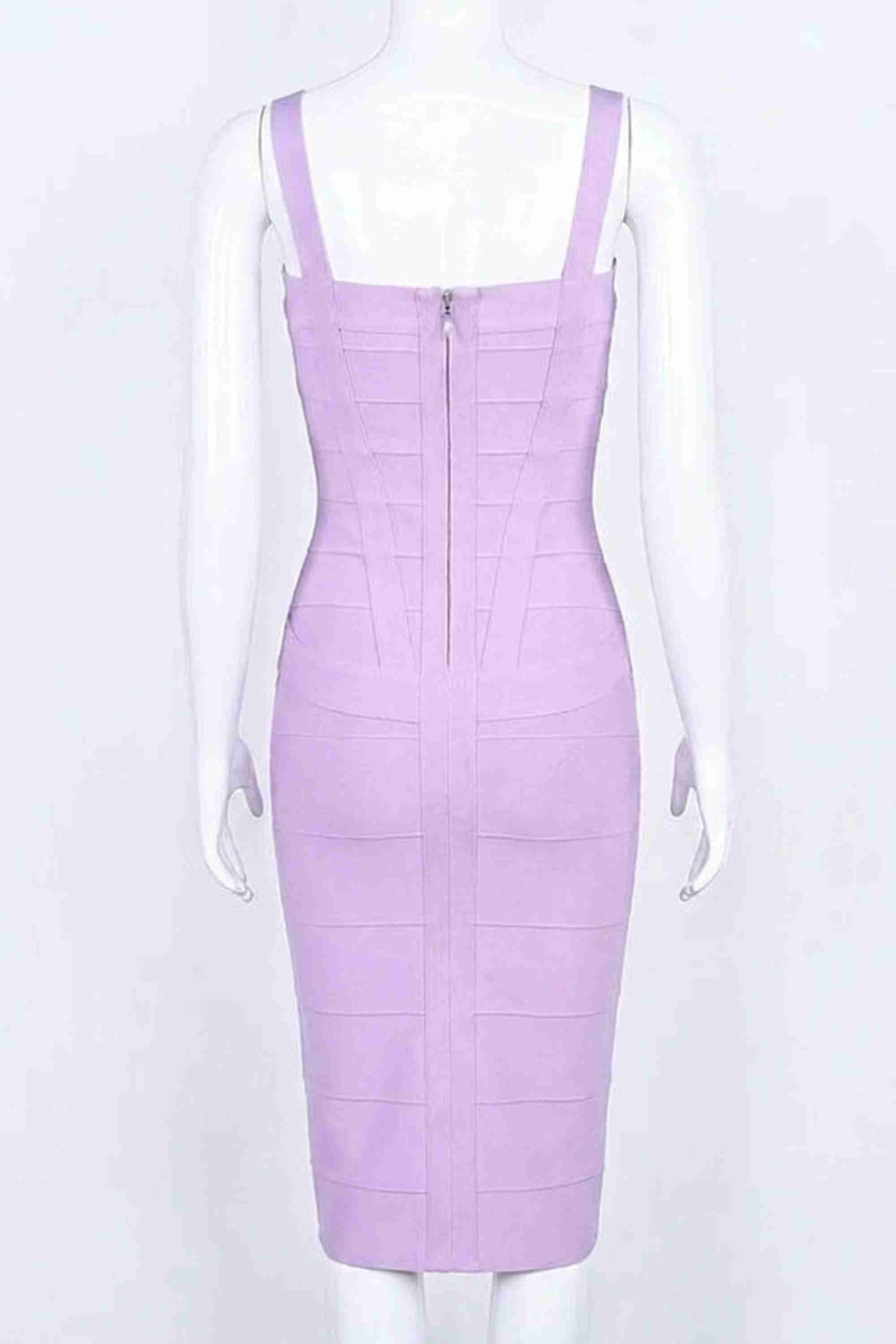 Woman wearing a figure flattering Heidi Bandage Midi Dress - Violet Bodycon Collection