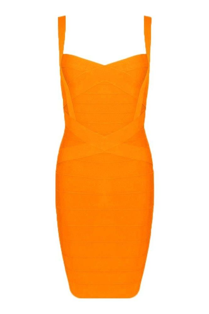 Woman wearing a figure flattering Heidi Bandage Mini Dress - Apricot Orange Bodycon Collection