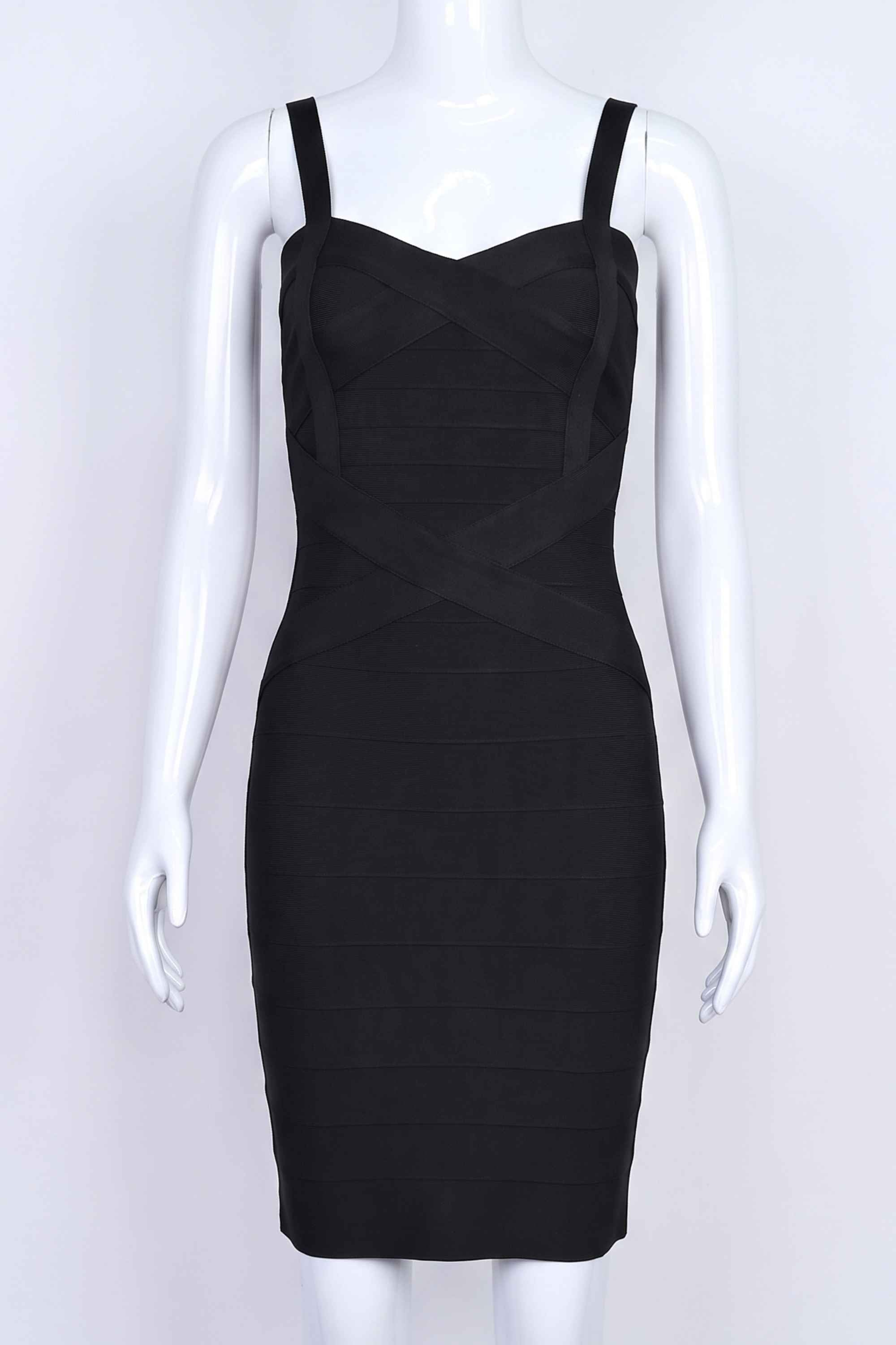 Woman wearing a figure flattering Heidi Bandage Mini Dress - Classic Black Bodycon Collection