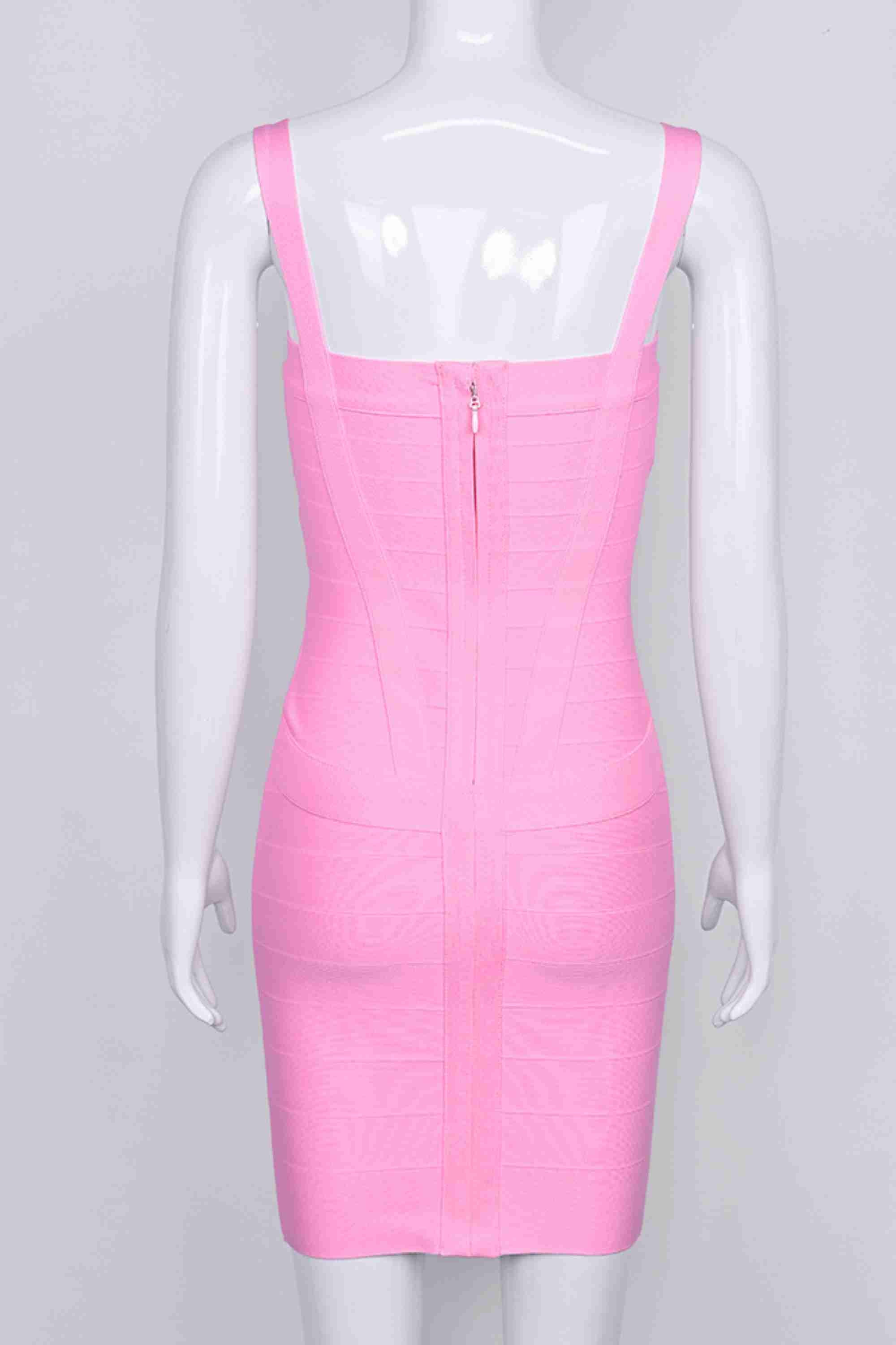 Woman wearing a figure flattering Heidi Bandage Mini Dress - Dusty Pink Bodycon Collection
