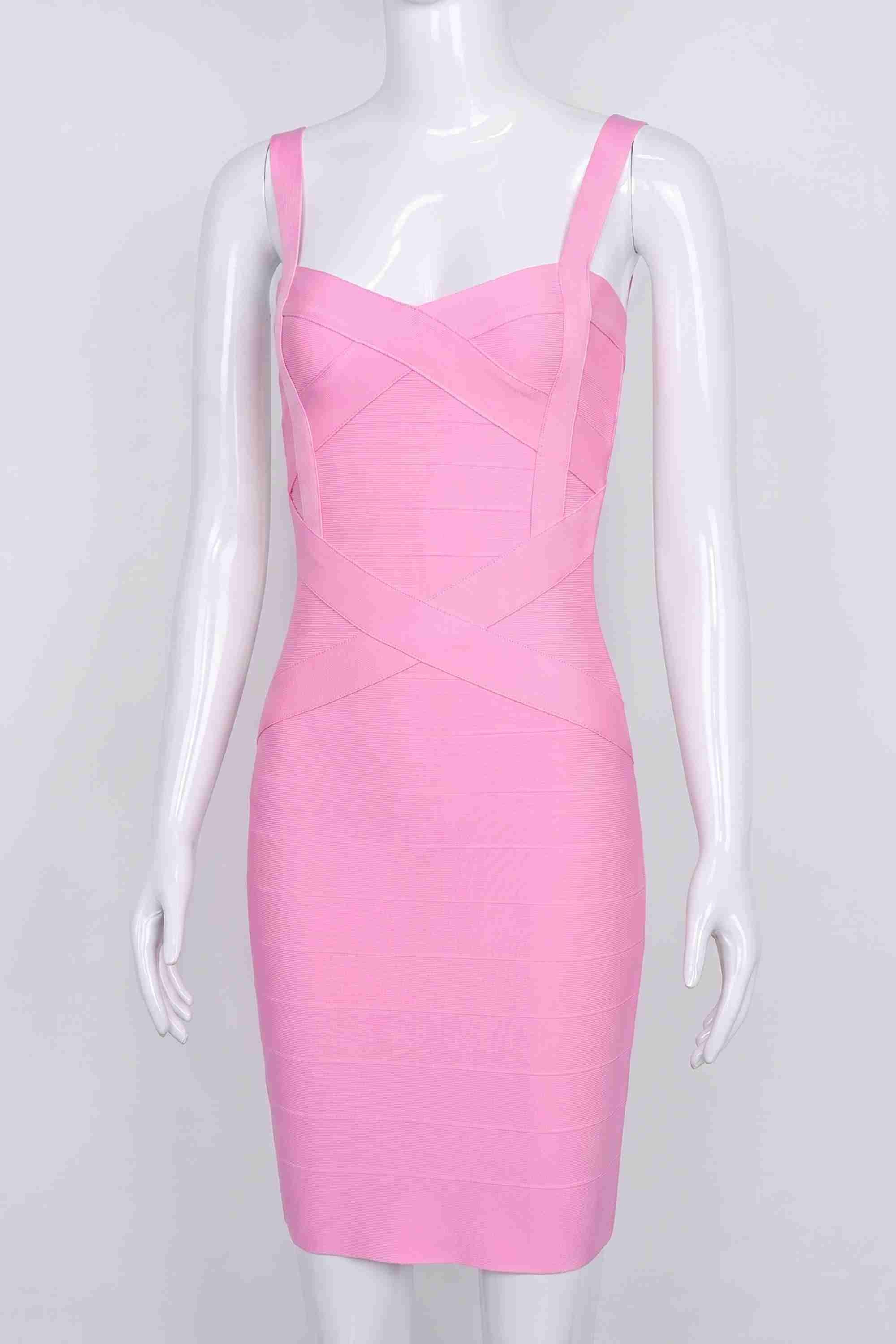 Woman wearing a figure flattering Heidi Bandage Mini Dress - Dusty Pink Bodycon Collection