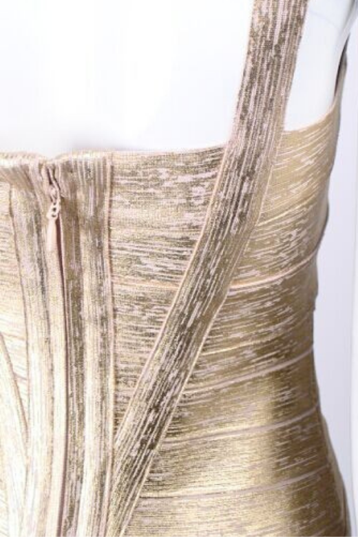 Woman wearing a figure flattering Heidi Bandage Mini Dress - Gold Bodycon Collection