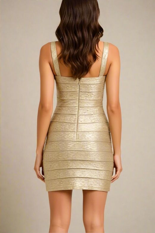 Woman wearing a figure flattering Heidi Bandage Mini Dress - Gold Bodycon Collection