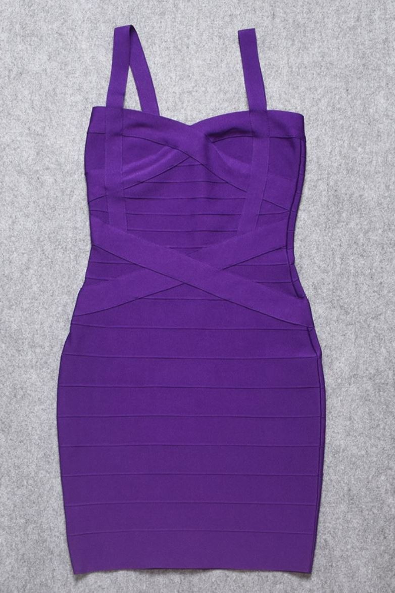 Woman wearing a figure flattering Heidi Bandage Mini Dress - Plum Purple Bodycon Collection