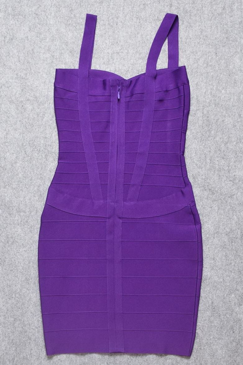 Woman wearing a figure flattering Heidi Bandage Mini Dress - Plum Purple Bodycon Collection