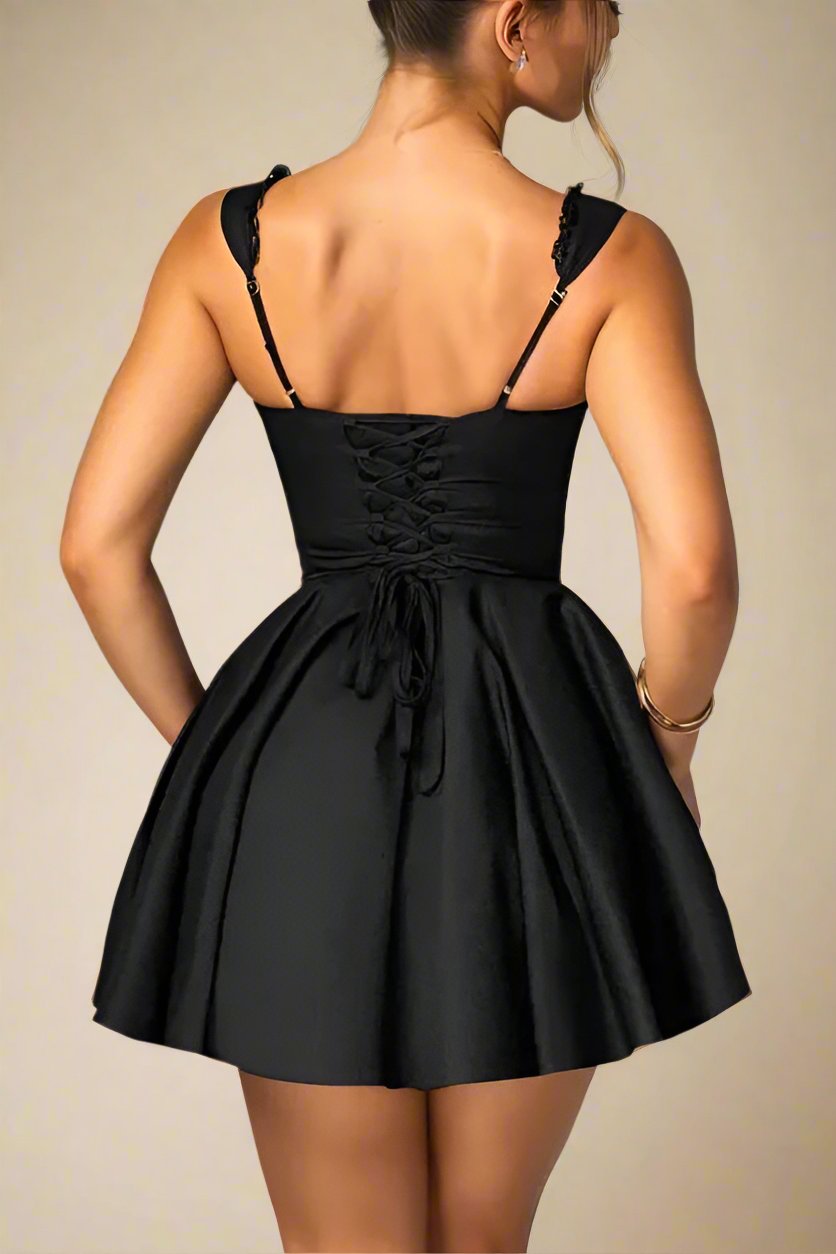 Woman wearing a figure flattering Adelyn Bodycon Mini Dress - Classic Black BODYCON COLLECTION