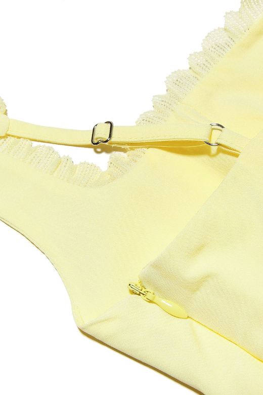 Woman wearing a figure flattering Adelyn Bodycon Mini Dress - Sun Yellow BODYCON COLLECTION