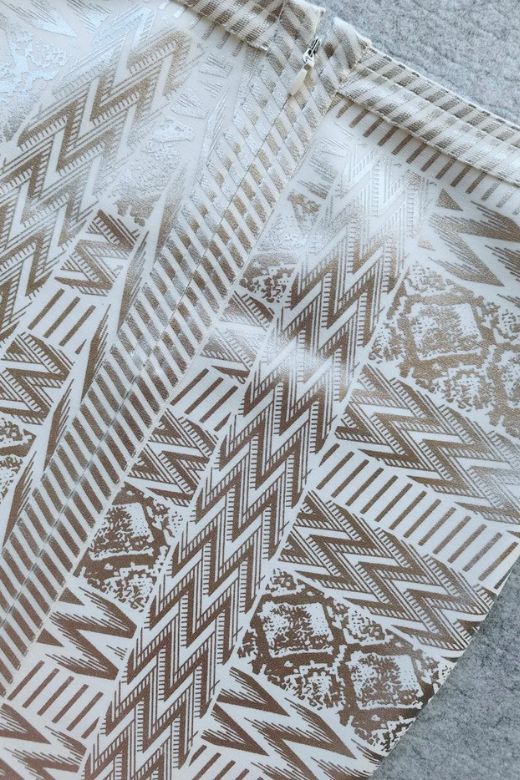 Woman wearing a figure flattering High Waist Metallic Mini Skirt - Silver BODYCON COLLECTION