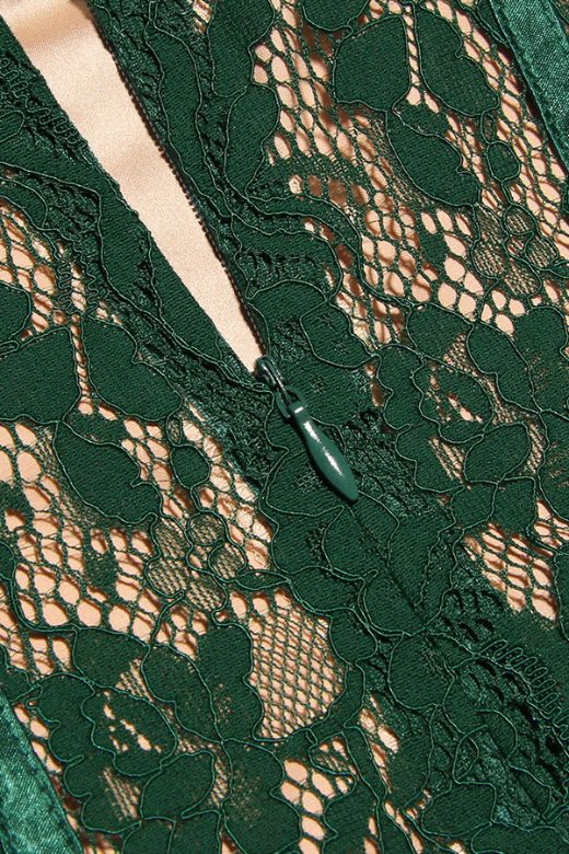 Woman wearing a figure flattering Honor Bodycon Midi Dress - Emerald Green BODYCON COLLECTION