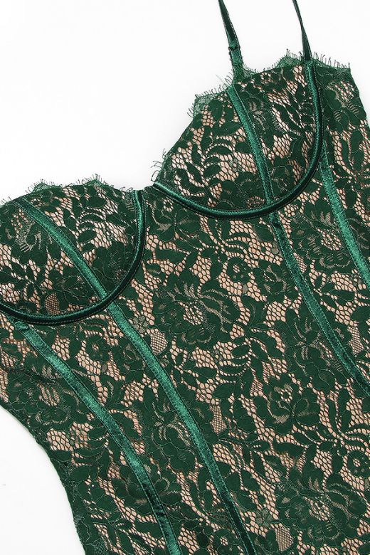 Woman wearing a figure flattering Honor Bodycon Midi Dress - Emerald Green BODYCON COLLECTION