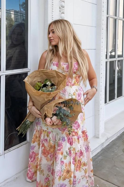 Woman wearing a figure flattering Imogen Bodycon Day Midi Dress - Dusty Pink BODYCON COLLECTION