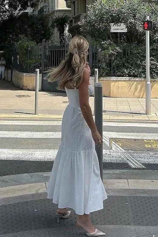 Woman wearing a figure flattering Imogen Bodycon Day Midi Dress - Pearl White BODYCON COLLECTION