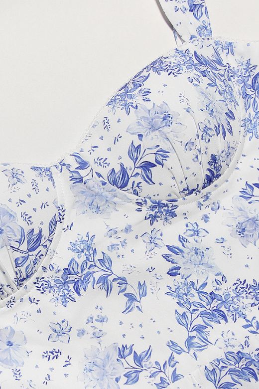 Woman wearing a figure flattering Imogen Bodycon Day Midi Dress - Sky Blue BODYCON COLLECTION