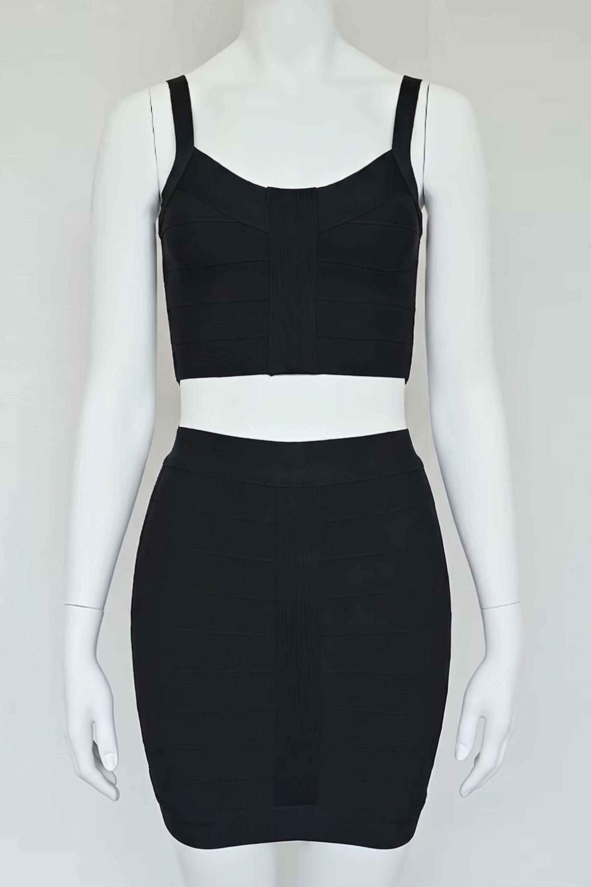 Woman wearing a figure flattering India Bandage Top and Mini Skirt Set - Classic Black BODYCON COLLECTION