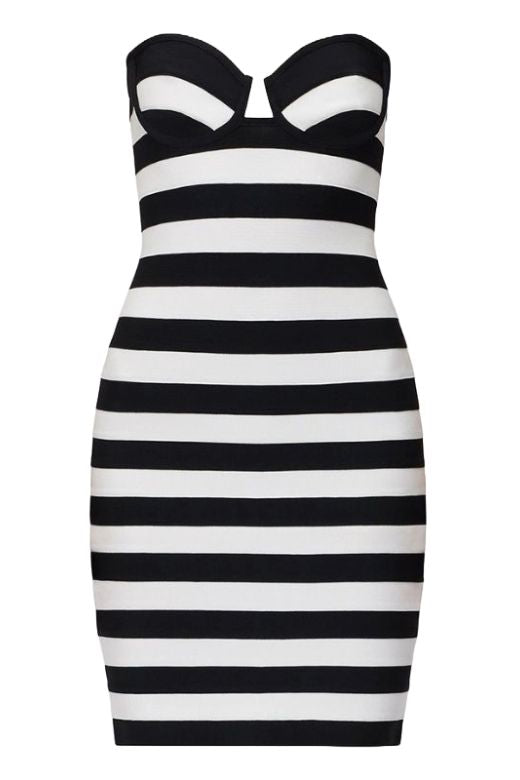 Woman wearing a figure flattering Ingrid Bandage Mini Dress - Classic Black BODYCON COLLECTION