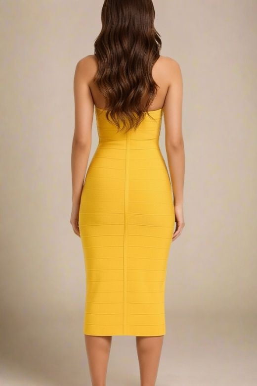 Woman wearing a figure flattering Isabella Bandage Midi Dress - Mustard Yellow BODYCON COLLECTION Pty Ltd