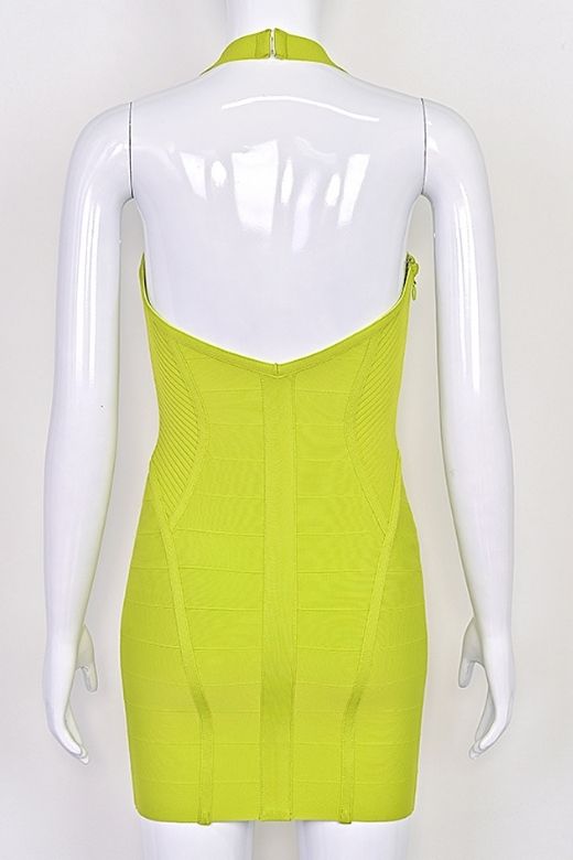 Woman wearing a figure flattering Isabella Bandage Mini Dress - Neon Green BODYCON COLLECTION Pty Ltd