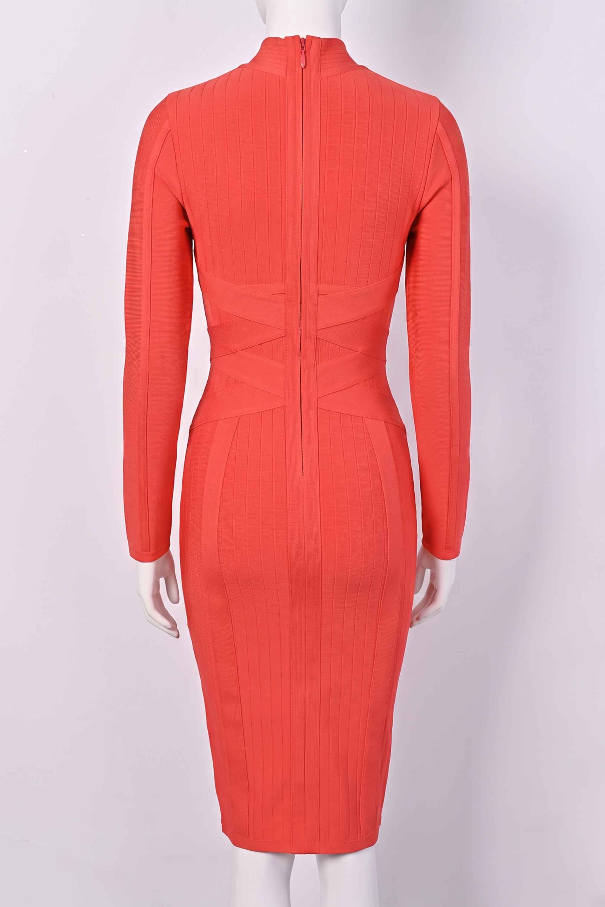 Woman wearing a figure flattering Jane Long Sleeve Bodycon Midi Dress - Lipstick Red Bodycon Collection