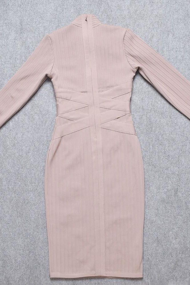Woman wearing a figure flattering Jane Long Sleeve Bodycon Midi Dress - Nude Bodycon Collection