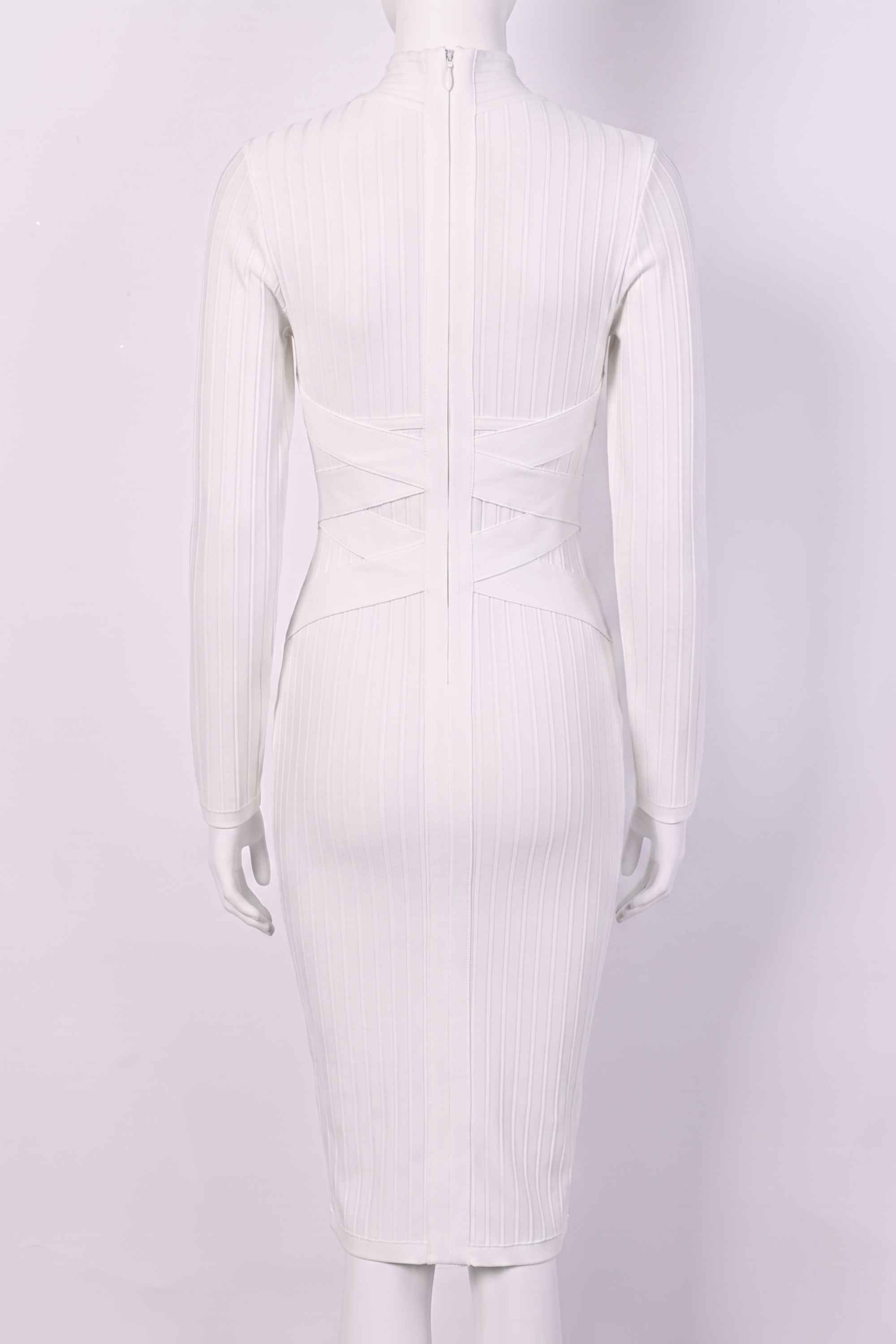 Woman wearing a figure flattering Jane Long Sleeve Bodycon Midi Dress - Pearl White Bodycon Collection