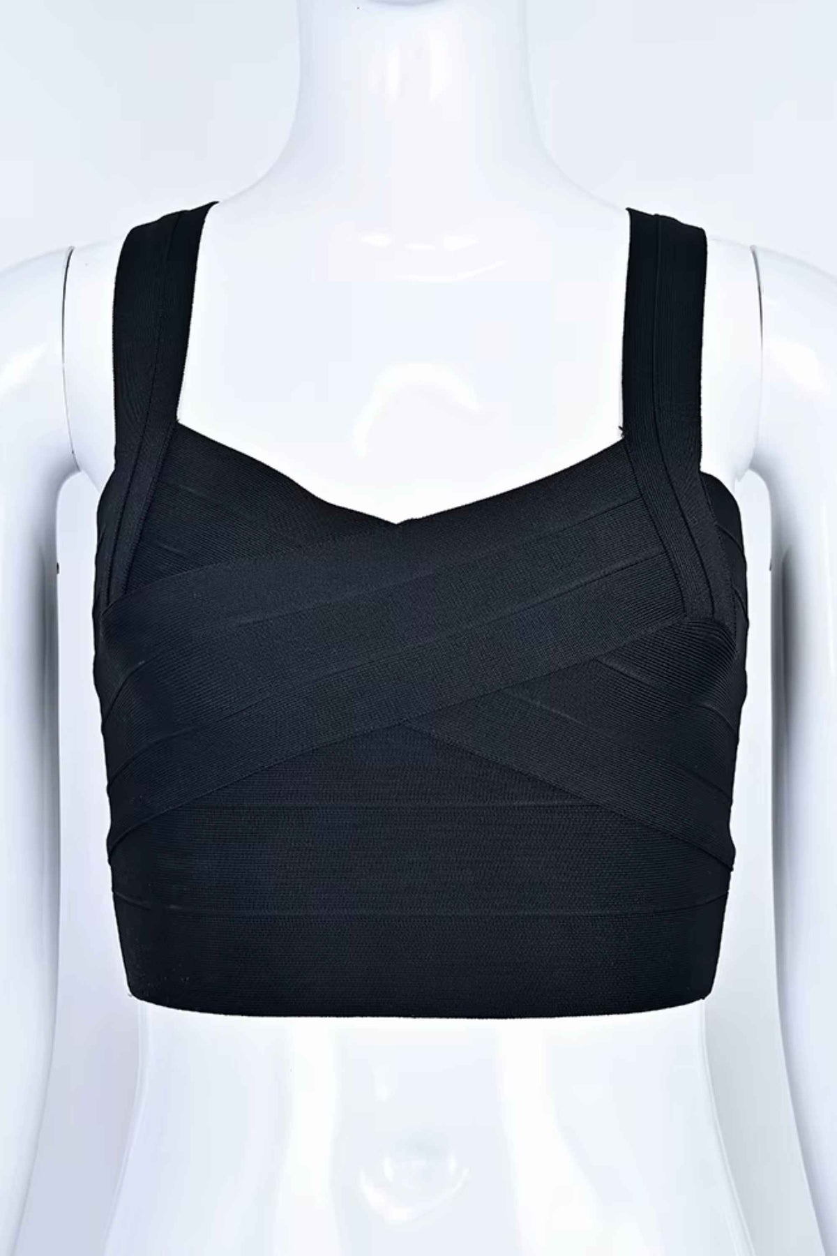 Woman wearing a figure flattering Jay Bandage Crop Top - Classic Black BODYCON COLLECTION