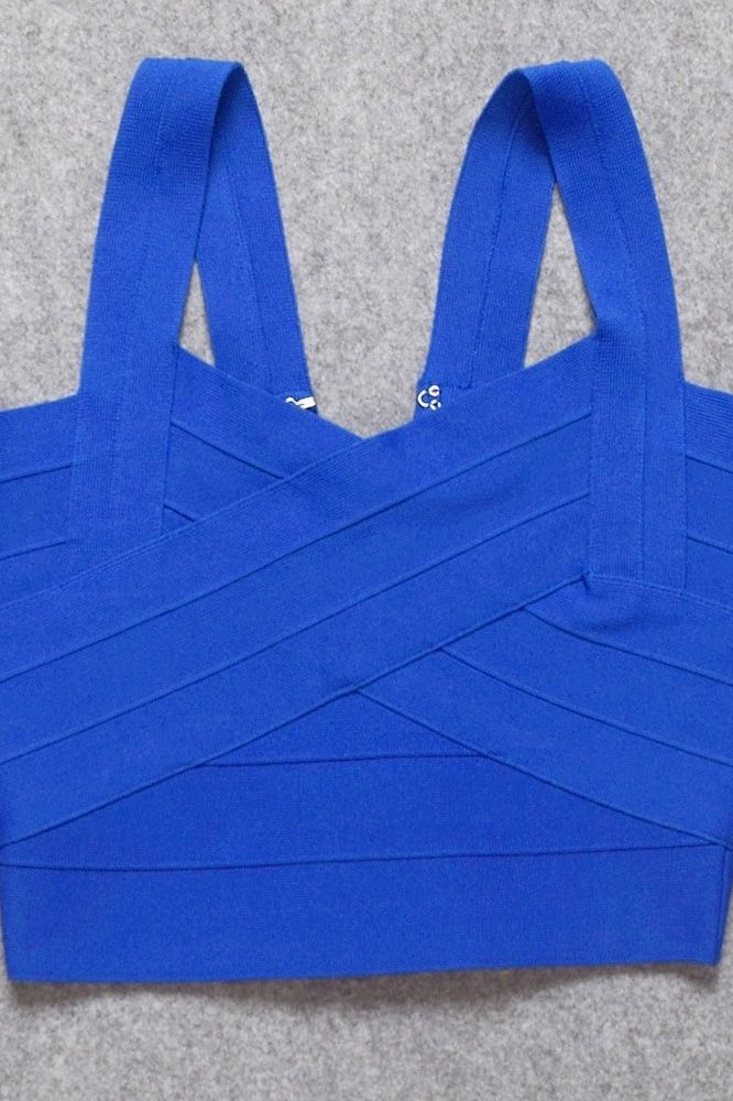 Woman wearing a figure flattering Jay Bandage Crop Top - Royal Blue BODYCON COLLECTION